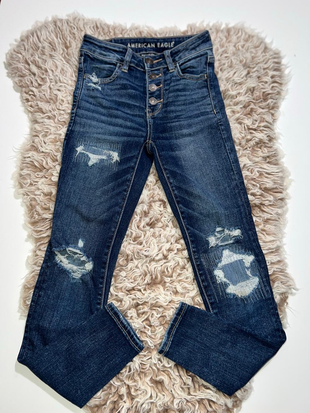 American Eagle next level stretch button zipper distressed hi rise jean jegging